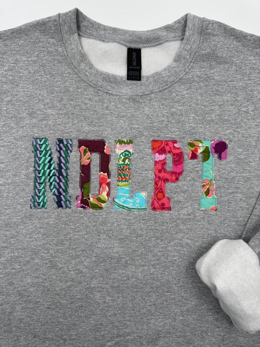 NDLPT Embroidered Applique Sweatshirt