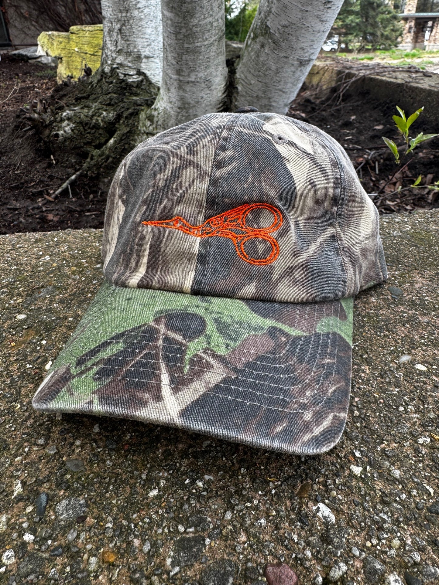 Camo Stork Scissor Baseball Hat